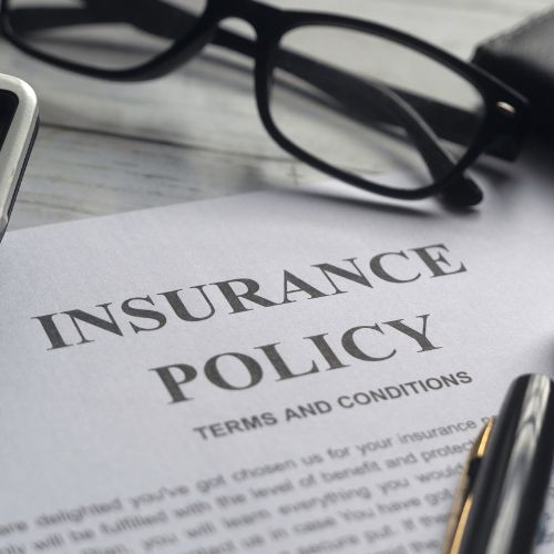 Insurance policy document with terms and conditions